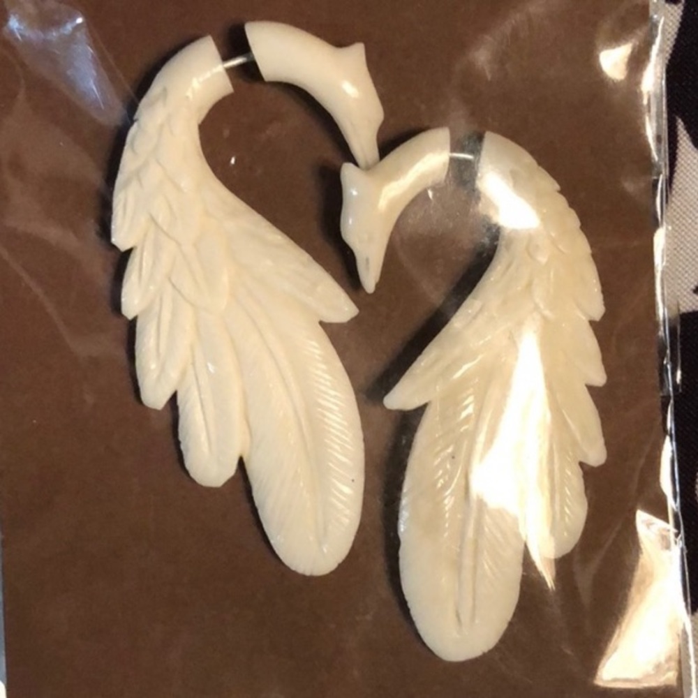Cobo angel wings earrings.  Joining together
